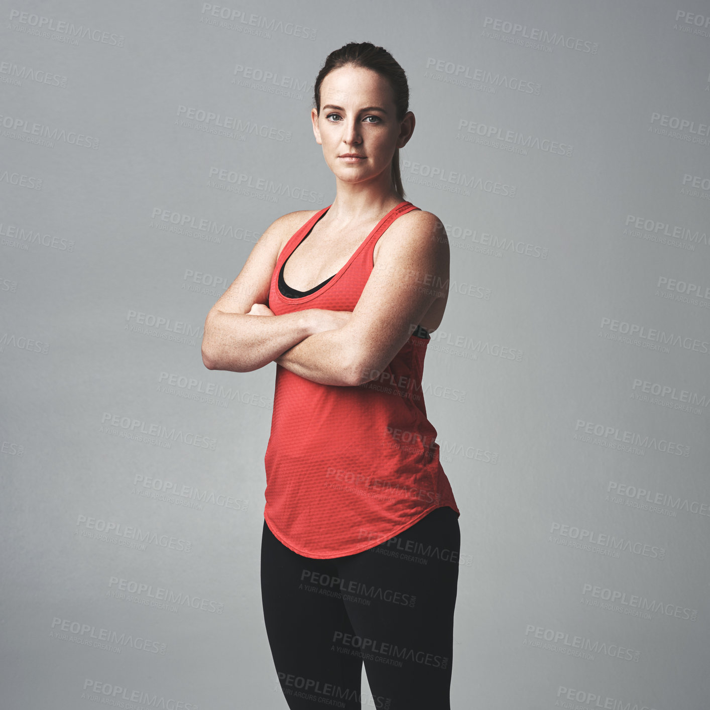 Buy stock photo Woman, portrait and confident in studio for training, strong and sportswear for workout or progress. Female person, athlete and arms crossed for exercise on gray background, health and body challenge