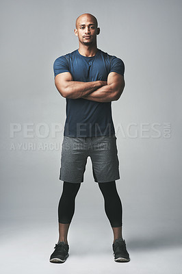 Buy stock photo Black man, portrait and confident in studio for fitness, strong and sportswear for workout or training. Male person, athlete and arms crossed for progress on gray background, tough and body challenge