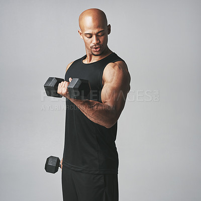 Buy stock photo Black man, dumbbells and fitness in studio, bicep and muscle progress or arm on gray background. Male person, sports and weights for workout and bodybuilding, mockup space and athlete for exercise