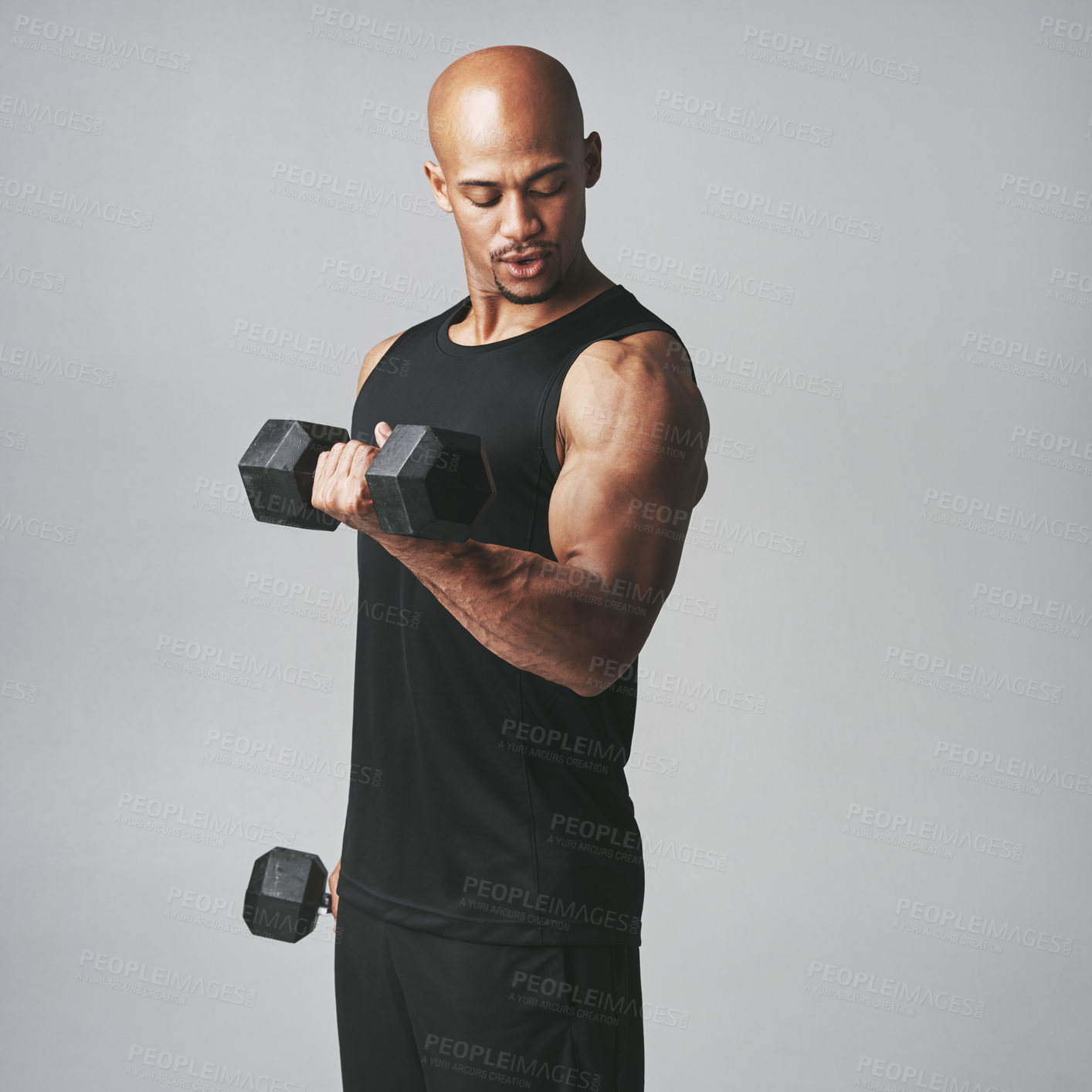 Buy stock photo Black man, dumbbells and fitness in studio, bicep and muscle progress or arm on gray background. Male person, sports and weights for workout and bodybuilding, mockup space and athlete for exercise