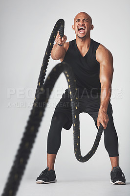 Buy stock photo Fitness, black man and rope in studio, energy and gym with training, exercise and workout for sports. Grey background, body builder and goals for health, sportswear and muscle, athlete and person