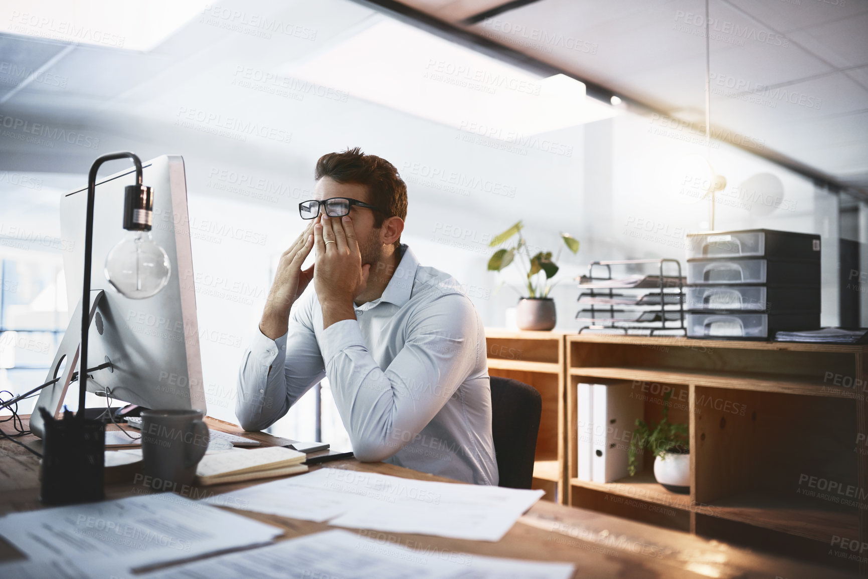 Buy stock photo Fatigue, stress and tired businessman in office on computer working on deadline, project and online report. Corporate demand, eye strain and exhausted database administrator with burnout and pressure