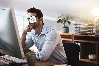 Buy stock photo Shot of a young businessman working late in an office with adhesive notes covering his eyes