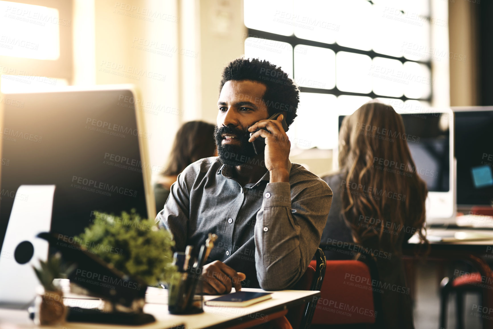 Buy stock photo Phone call, business and black man in office, computer and connection with network, talking and conversation. Person, employee and consultant with smartphone, mobile user and communication with pc