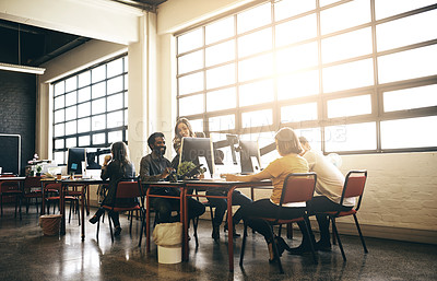 Buy stock photo Cropped shot of colleagues discussing something on a computer