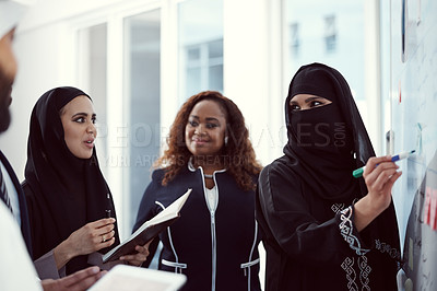 Buy stock photo Training, team and business muslim woman in office for investor workshop, presentation and teaching. Stakeholder update, coaching and speaker with employees in conference for meeting in Qatar