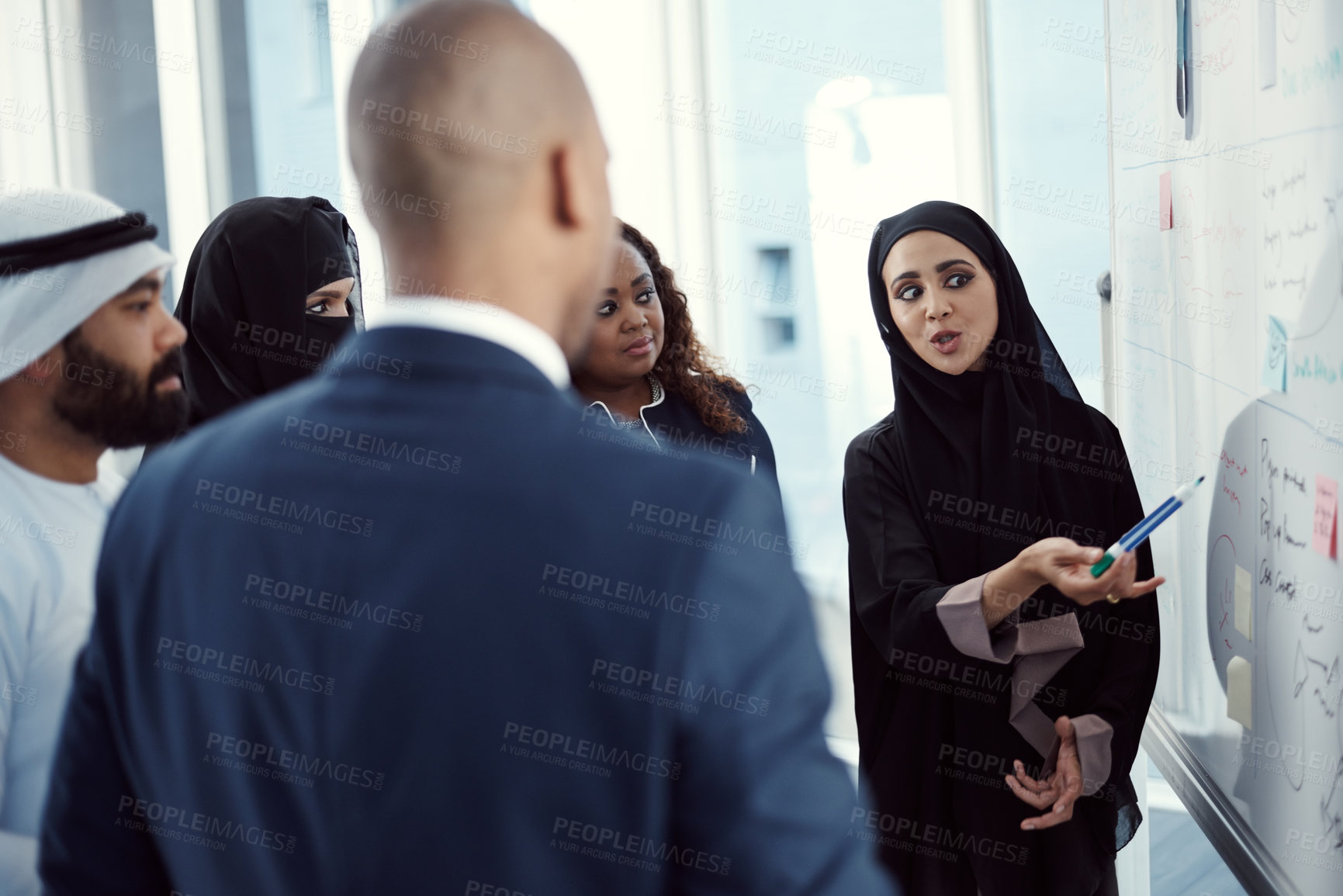 Buy stock photo Training, people or team at whiteboard in office for trading tips, finance upskill or muslim speaker. Coaching, investors and arab coworkers in workshop for stocks advice, market trends and diversity