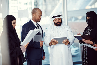 Buy stock photo Tablet, team and meeting with business people in office at conference for global advisor, research and diversity. Representative, planning and workshop with employees for event, trade show and online