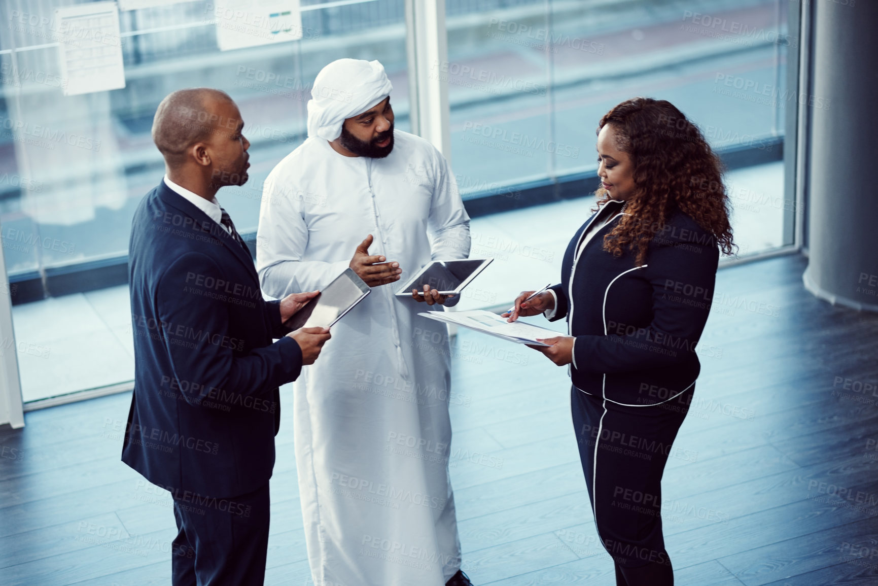 Buy stock photo Planning, above and team of business people in office for meeting, trading workshop and conference. Investment discussion, middle east advisor and collaboration with employee at expo in Dubai 