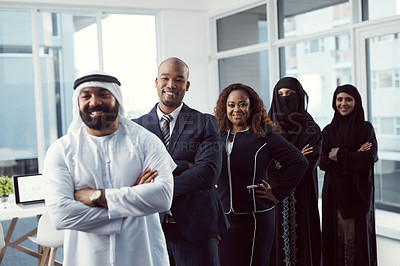 Buy stock photo Cropped shot of a diverse group of business colleagues standing in a single line in their corporate office