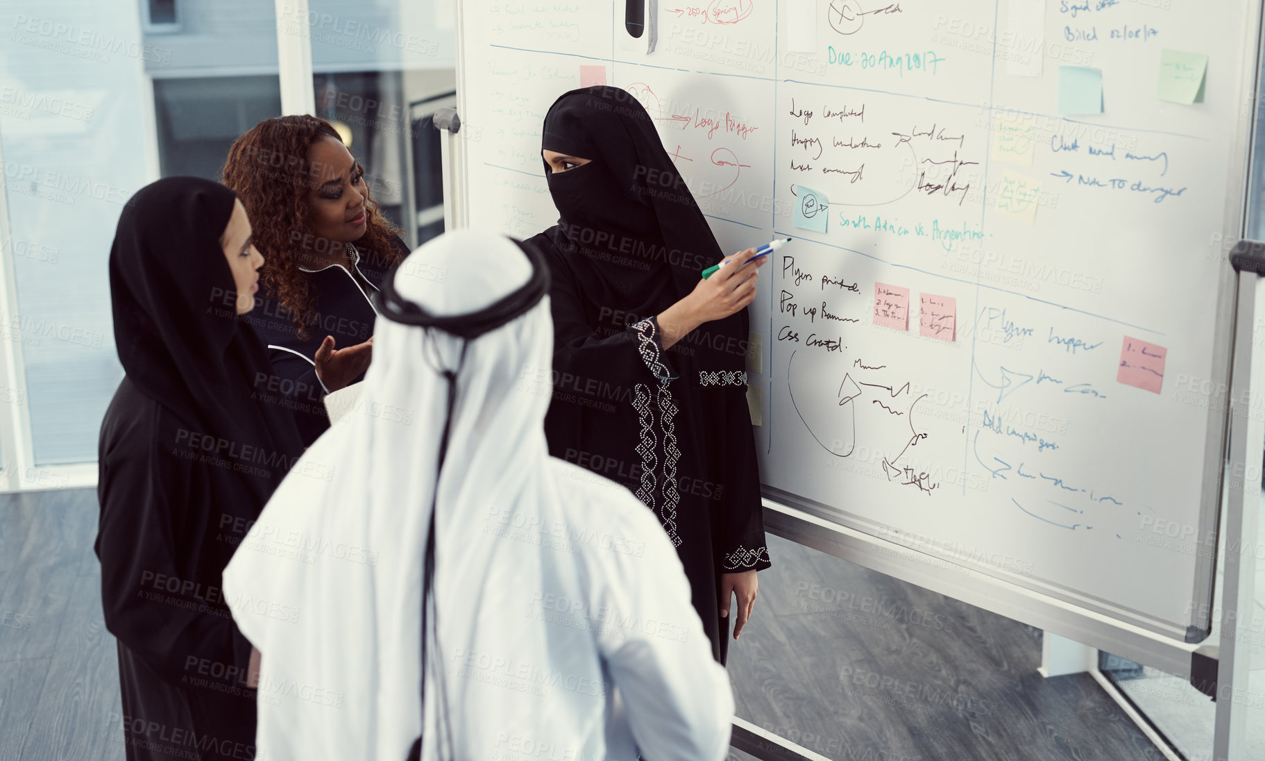 Buy stock photo Team, presentation and business muslim woman in office for investor workshop, training and teaching. Stakeholder update, coaching and speaker with employees in conference for meeting in Qatar