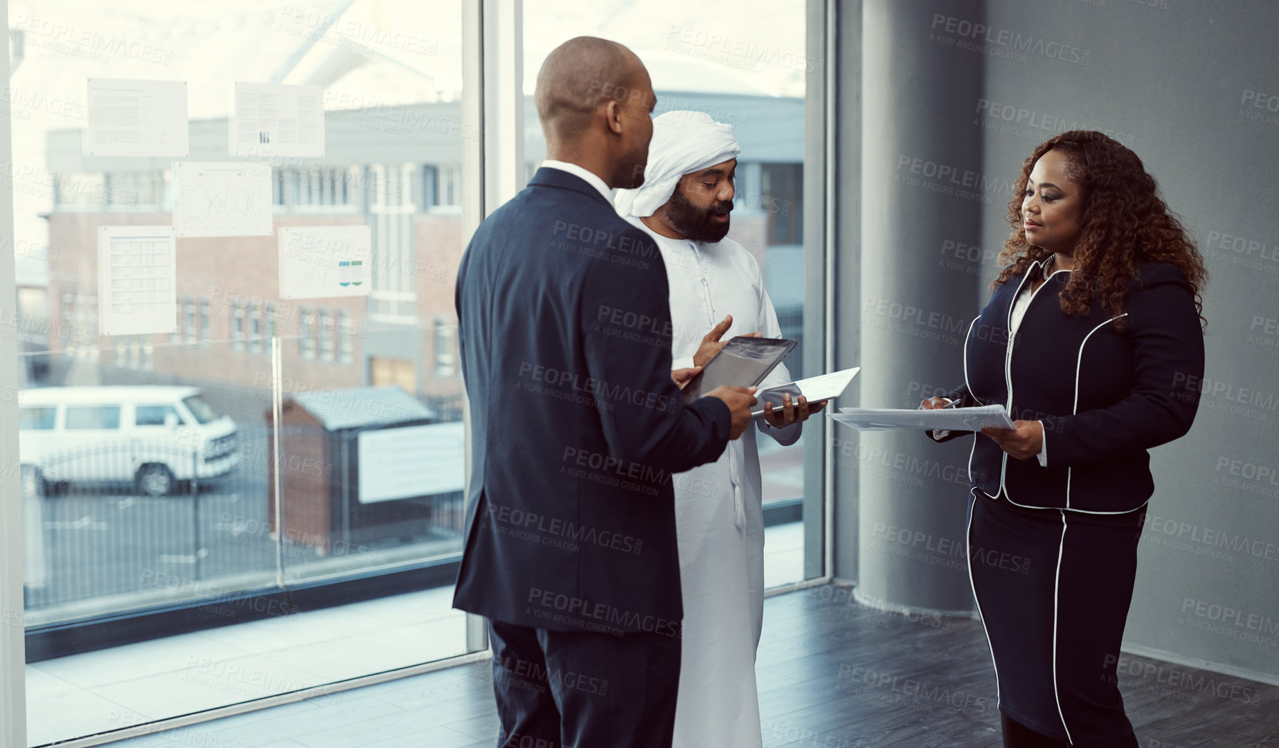 Buy stock photo Meeting, team and planning with business people in office for trading workshop, discussion and b2b advisor. Partner, employees and portfolio manager with Middle east representative at expo in Qatar