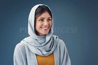 Buy stock photo Thinking, fashion and smile of muslim woman with idea in studio isolated on blue background mockup space. Happy person, Islamic hijab and dream for vision, inspiration or decision with casual clothes