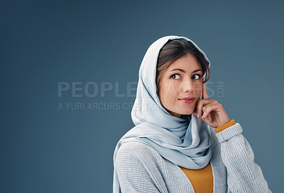 Buy stock photo Woman, studio and thinking in hijab with hands for vision with confidence for plan with ideas. Islamic culture, pride and blue background for Arab people with religion, middle east and natural