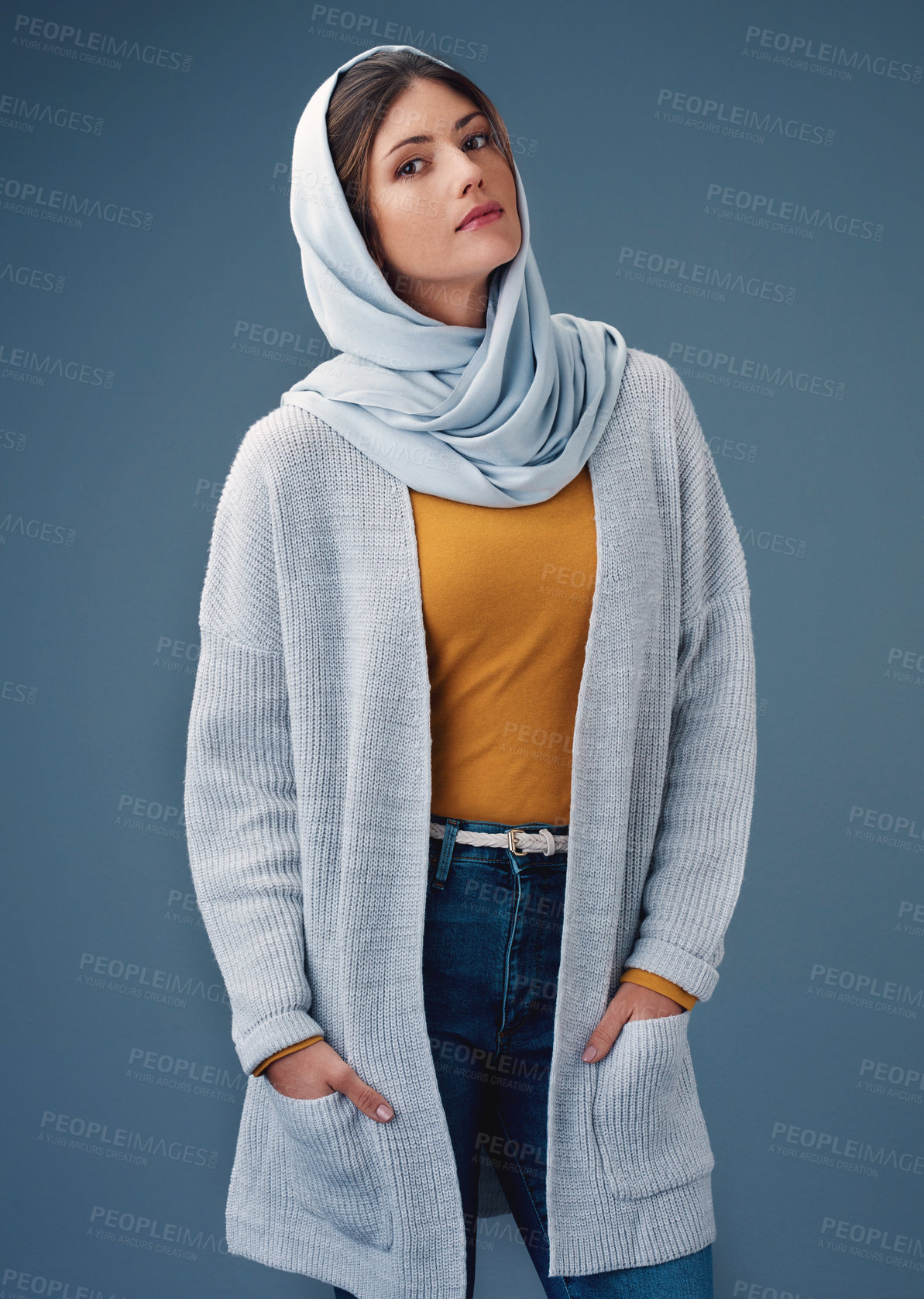 Buy stock photo Portrait, studio and fashion with muslim woman, clothes for eid fitr or modesty for religion and faith. Grey background, chiffon scarf hijab with Saudi model, trendy or confident for islam culture  