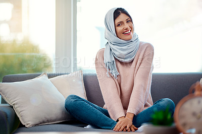 Buy stock photo Sofa, smile and portrait of Muslim woman for Eid, Ramadan and religious holiday at home, house and living room. Happiness, face and Islamic girl to relax on couch for break, weekend and to rest
