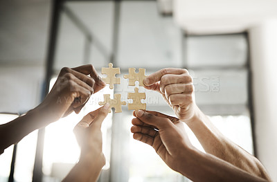 Buy stock photo Business people hands with puzzle showing solution, problem solving and teamwork. Smart group or team activity completing, finishing a task project or assignment in difficult challenging work crisis