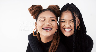 Buy stock photo Lesbian couple, portrait and fashion in studio with hug for style inspiration, happiness and love together. Serious, lgbt and black people with embrace for support, relationship and braids with smile