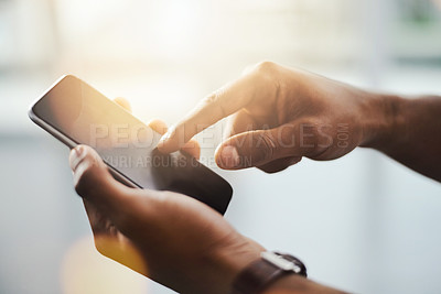 Buy stock photo Closeup shot of a businessman using a cellphone
