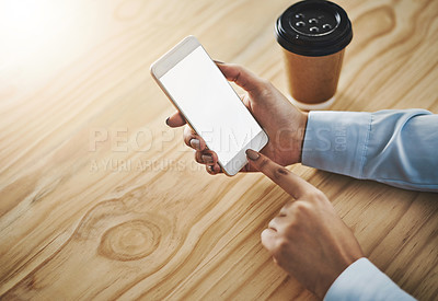 Buy stock photo Closeup shot of a businesswoman using a cellphone while drinking coffee