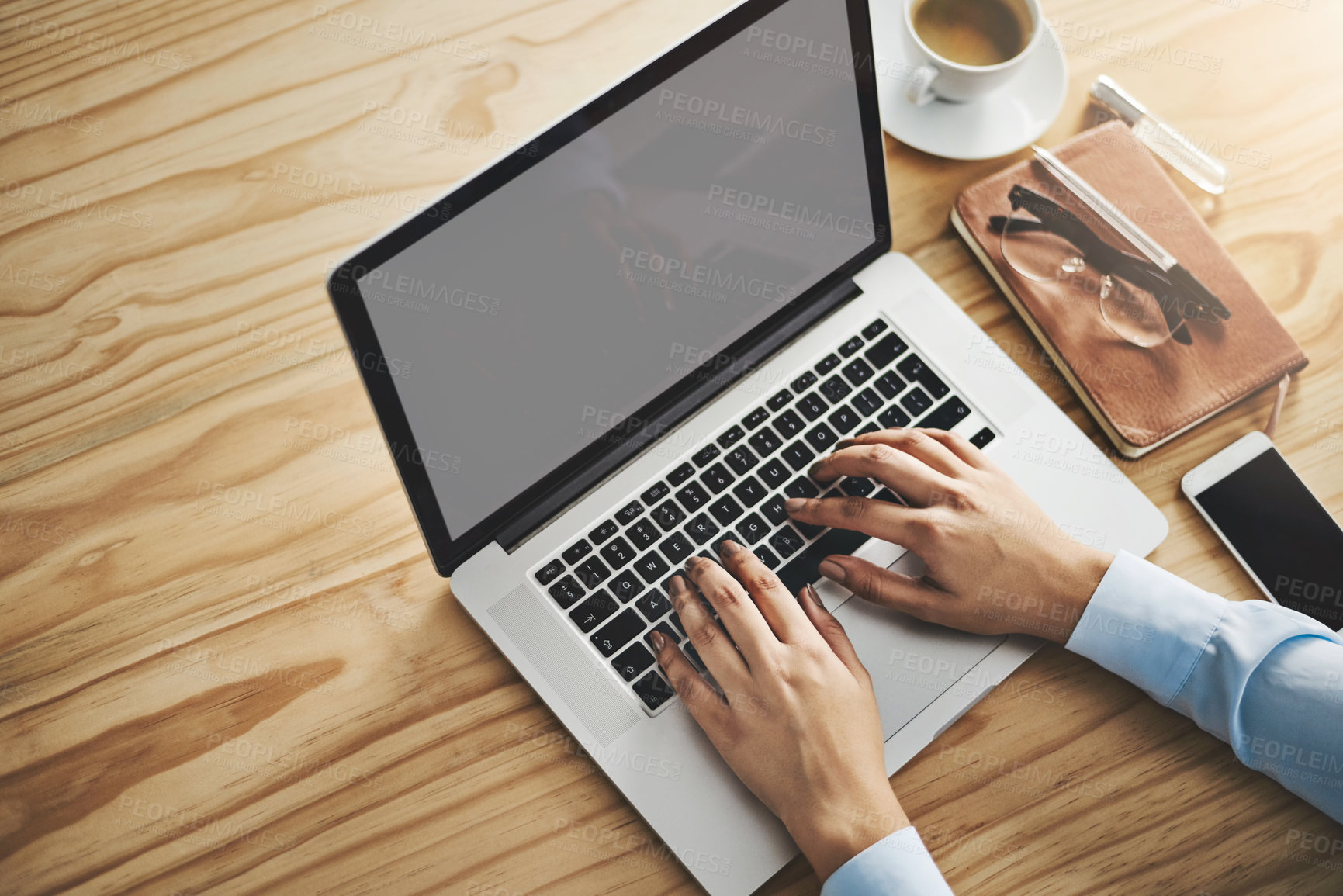 Buy stock photo Closeup shot of a businesswoman working on a laptop in an office