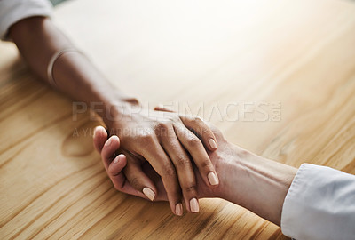 Buy stock photo Closeup shot of two people holding hands in comfort