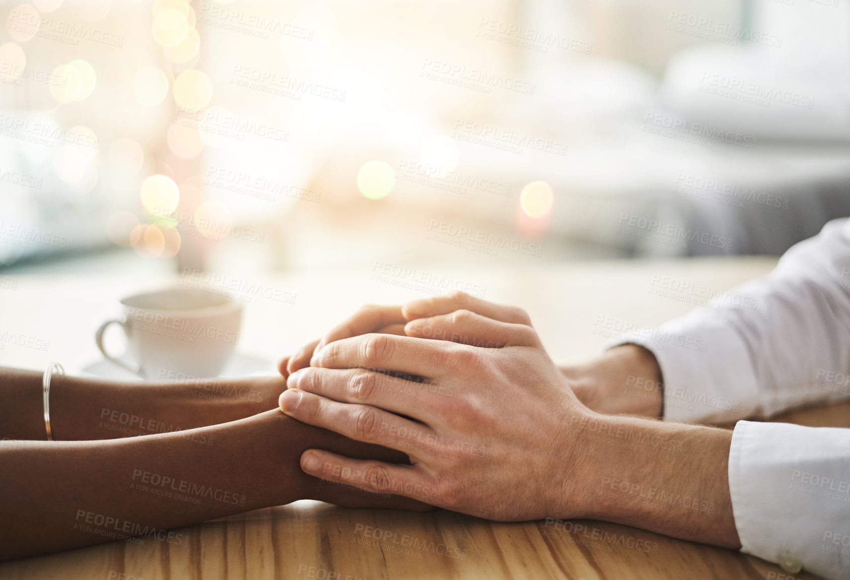 Buy stock photo Closeup shot of two people holding hands in comfort