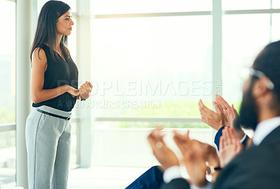 Buy stock photo Cropped shot of an attractive young businesswoman fielding questions from her colleagues during a seminar