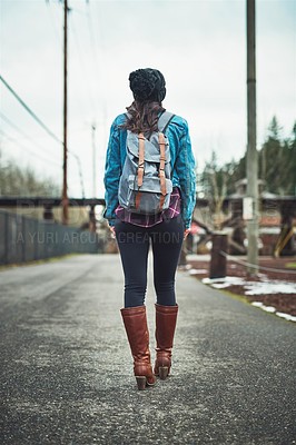 Buy stock photo Back, woman and walking on road for journey, adventure and travel in winter fashion. Person, freedom and backpacking on vacation for exploration, sightseeing and hitchhiking in Sweden for trip