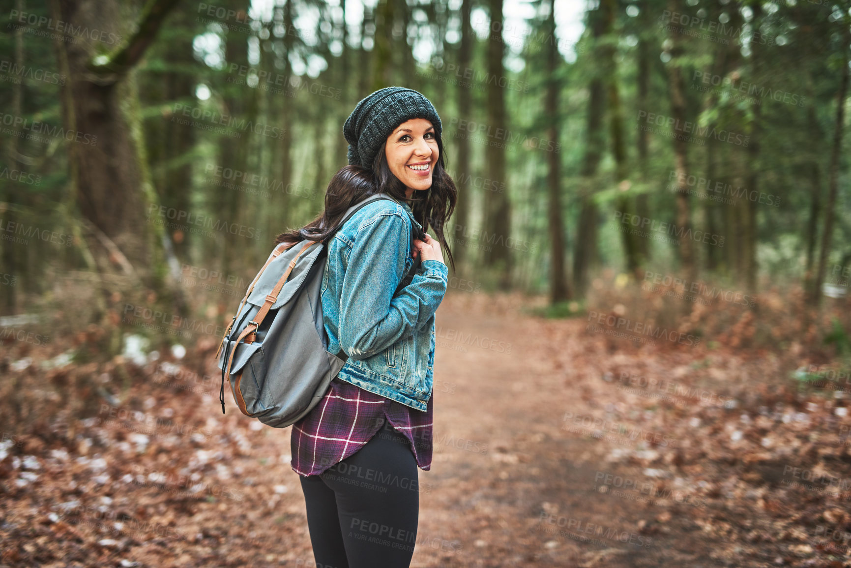 Buy stock photo Cropped shot of a young woman in the woods