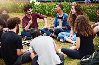 Buy stock photo Cropped shot of a group of college students having a discussion while sitting in a circle outside