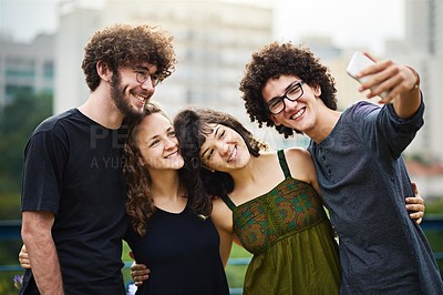 Buy stock photo College, friends and selfie outdoor on university campus with smile, social media and profile picture update. Students, education and online with photo and happy reunion with hug in park on summer