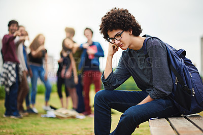 Buy stock photo Cropped shot of a young male college student being teased outside