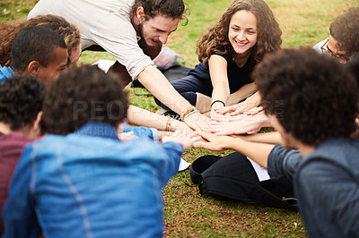 Buy stock photo Cropped shot of a group of college students hands piled on top of each other outside