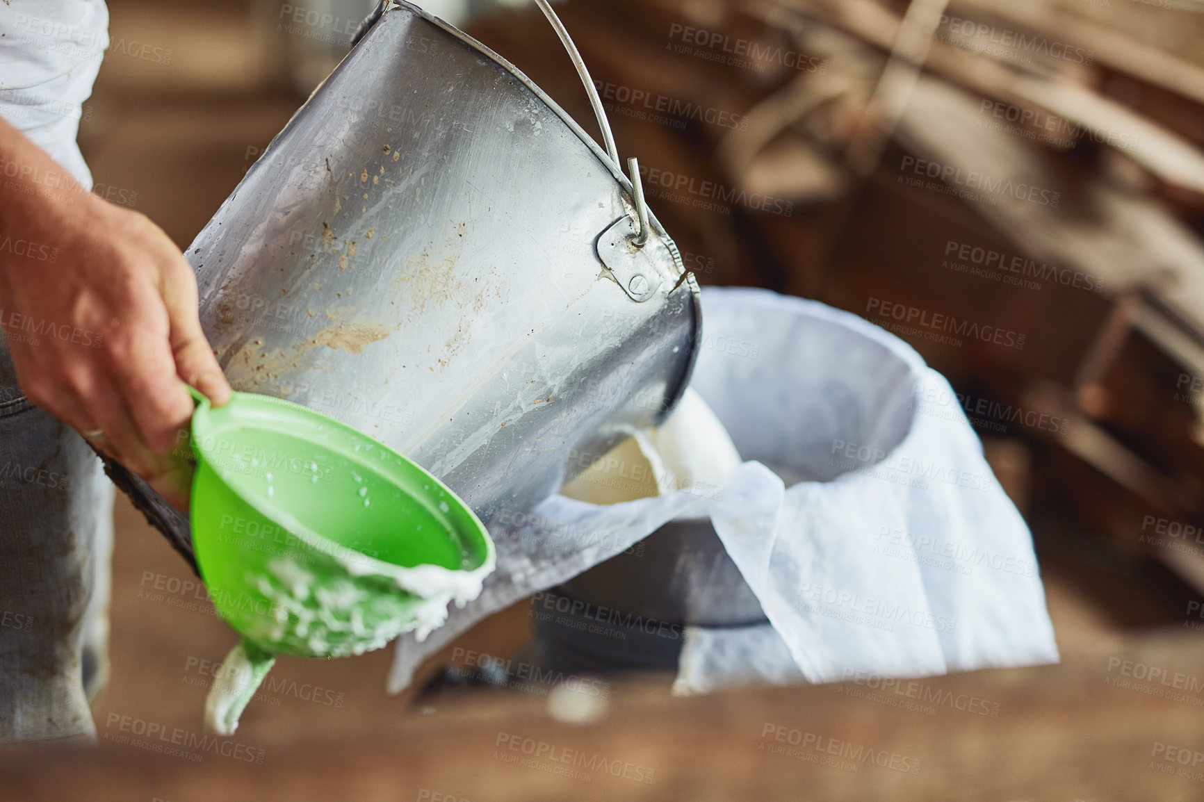 Buy stock photo Person, farmer and bucket with milk for fresh produce or calcium in natural growth, agriculture or sustainability. Closeup of container production with mineral liquid, resources or dairy farming