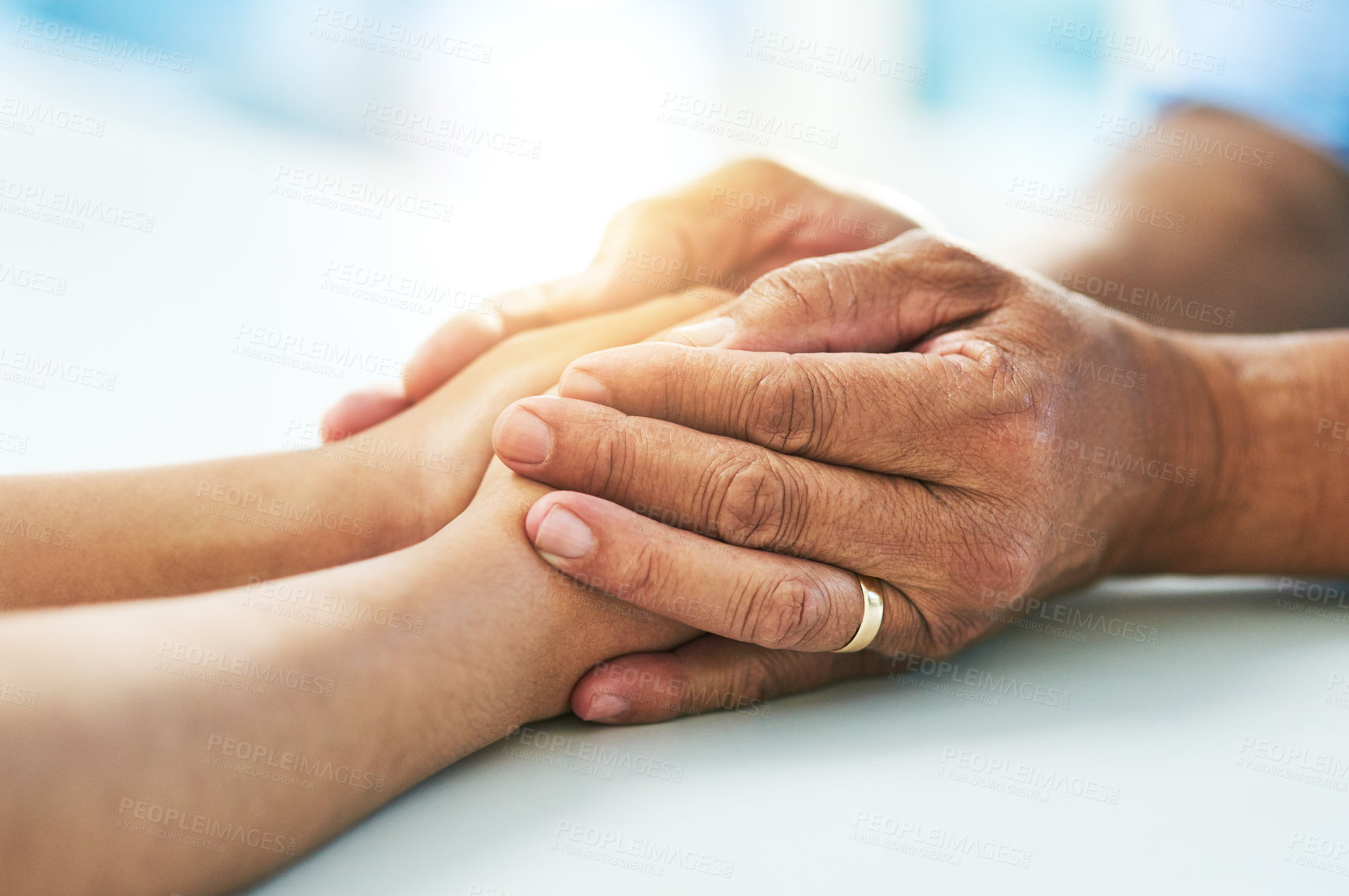 Buy stock photo Doctor, people and holding hands for thanks in hospital, kindness and support for medical news. Physician, patient and help with diagnosis consultation, compassion and specialist for communication