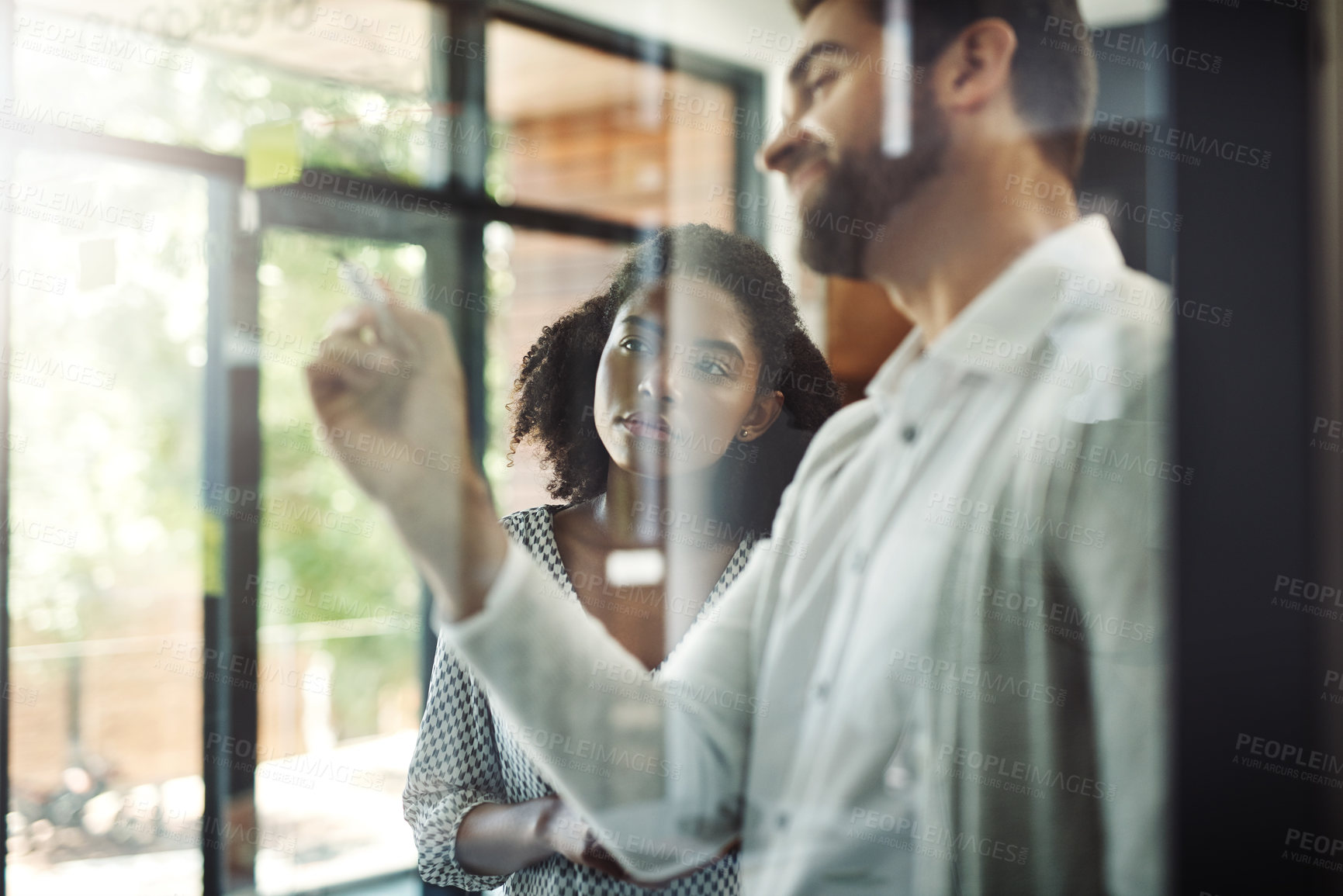 Buy stock photo Cropped shot of businesspeople discussing ideas