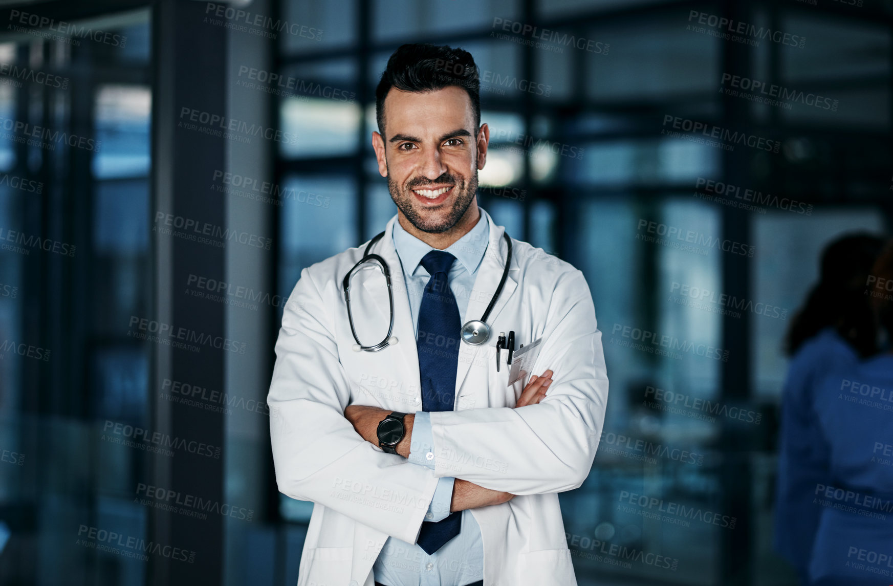 Buy stock photo Portrait of a confident young doctor working in a hospital