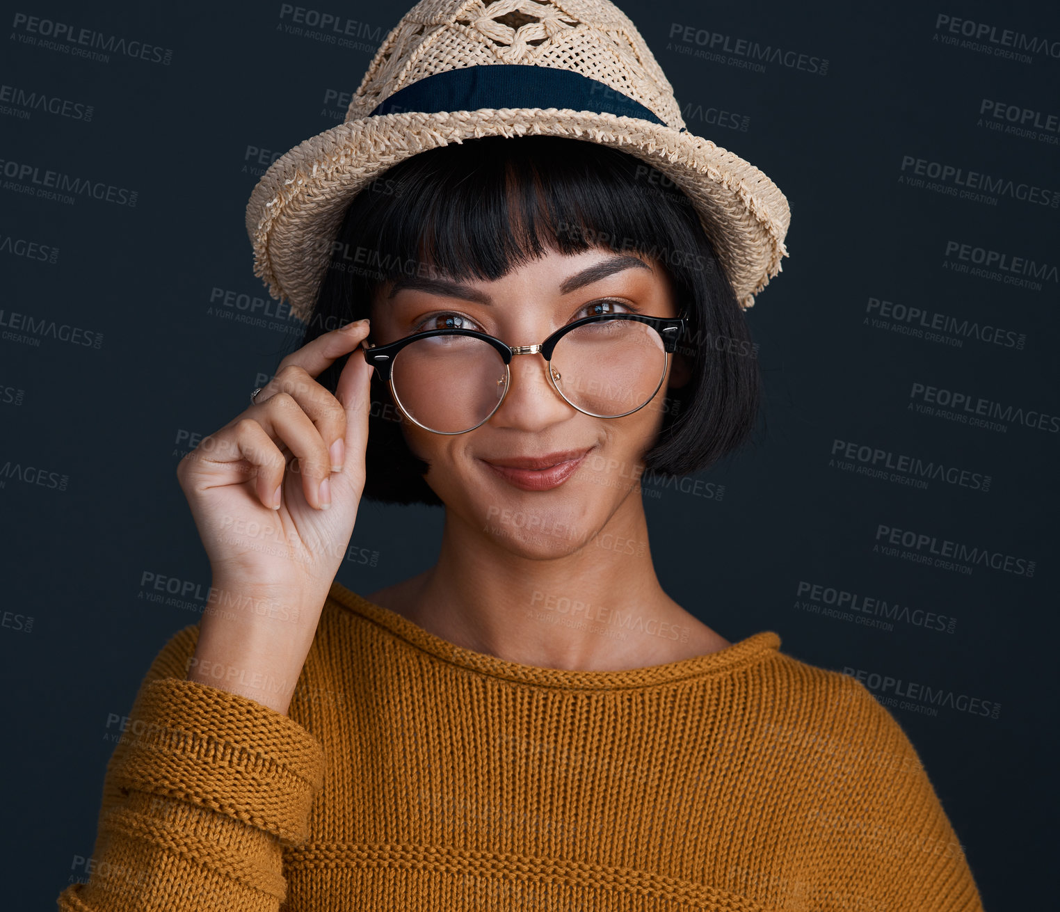 Buy stock photo Glasses, hat and portrait of fashion woman on dark studio background for trendy clothing accessories. Eyewear, face and smile of confident or happy model for clothes outfit, style or wardrobe