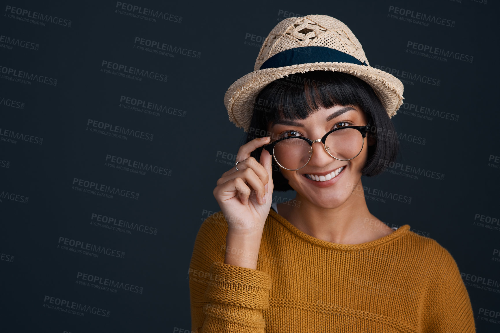 Buy stock photo Glasses, hat and portrait of fashion woman on dark background for trendy clothing accessories. Eyewear, face and smile of happy model on black mockup space for clothes outfit, style or wardrobe