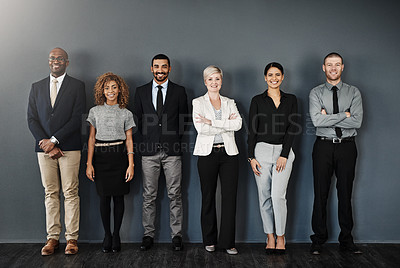 Buy stock photo Diversity, smile and portrait of business people in studio for support, community and teamwork. Happy, collaboration and professional with employees and wall background for motivation and mission