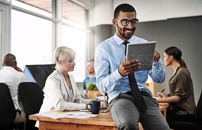 Buy stock photo Businessman, typing and happy on tablet in office for corporate research, company website and communication. Professional, coworkers and digital tech at work for email feedback and online information