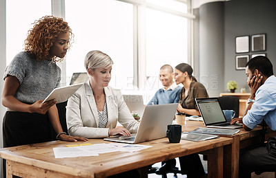 Buy stock photo Business, laptop and people in office for help, advice and feedback in finance department. Woman leader, staff and tech at table for information, accounting and research for company growth in city