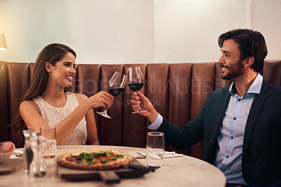 Buy stock photo Wine, cheers and valentines day with a couple in a restaurant for celebration of love, romance and fine dining. Alcohol, roast or anniversary with a young man and woman on a romantic date together