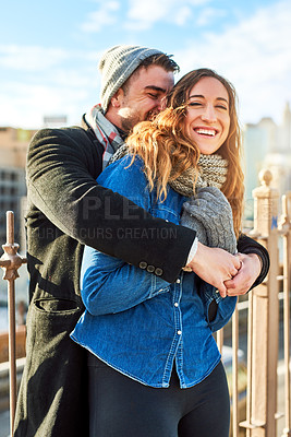 Buy stock photo Shot of an affectionate young couple enjoying their foreign getaway