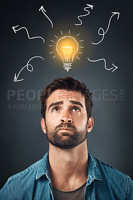 Buy stock photo Man, idea and thinking by gray background for mockup with confusion, decision and lightbulb drawing. Thoughtful, innovation and person in studio with illustration for uncertain, doubt and question