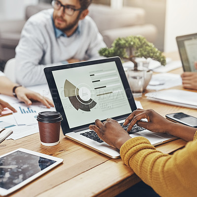 Buy stock photo High angle shot of unrecognizable colleagues having a meeting in the office