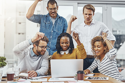 Buy stock photo Cropped shot of colleagues cheering at something on a laptop screen