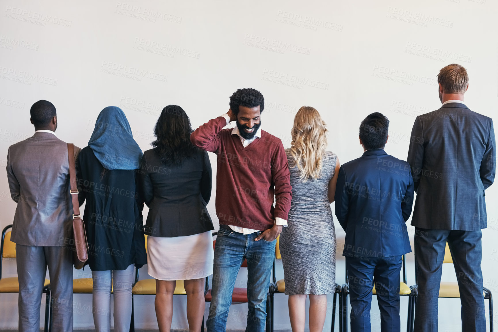 Buy stock photo Recruitment, business people and happy man in waiting room for success, selection and hired. Smile, new employee and thinking in lobby for job opportunity, gratitude and appreciation for career path