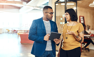 Buy stock photo Talking, tablet and business people in office for meeting, online networking and internet. Creative designers, teamwork and man and woman on digital tech for research project, website and consulting